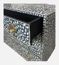 Handcrafted_cleo_bone_inlay_chest_of_drawers_with_intricate_design.webp